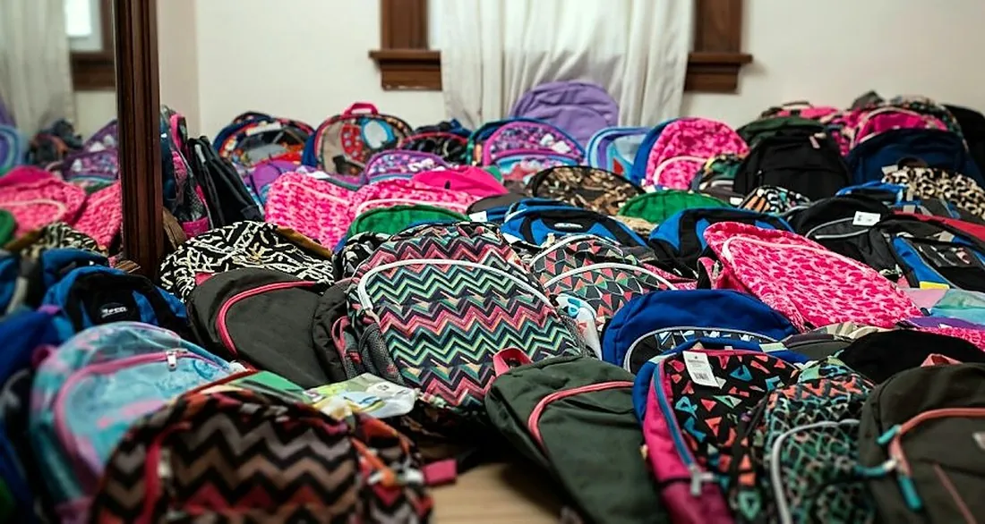 Sorted school supplies ready to be handed out to families